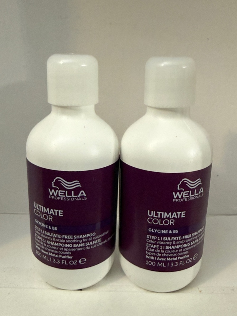 2Wella Professionals Ultimate Color Shampoos - Plum and White Bottles